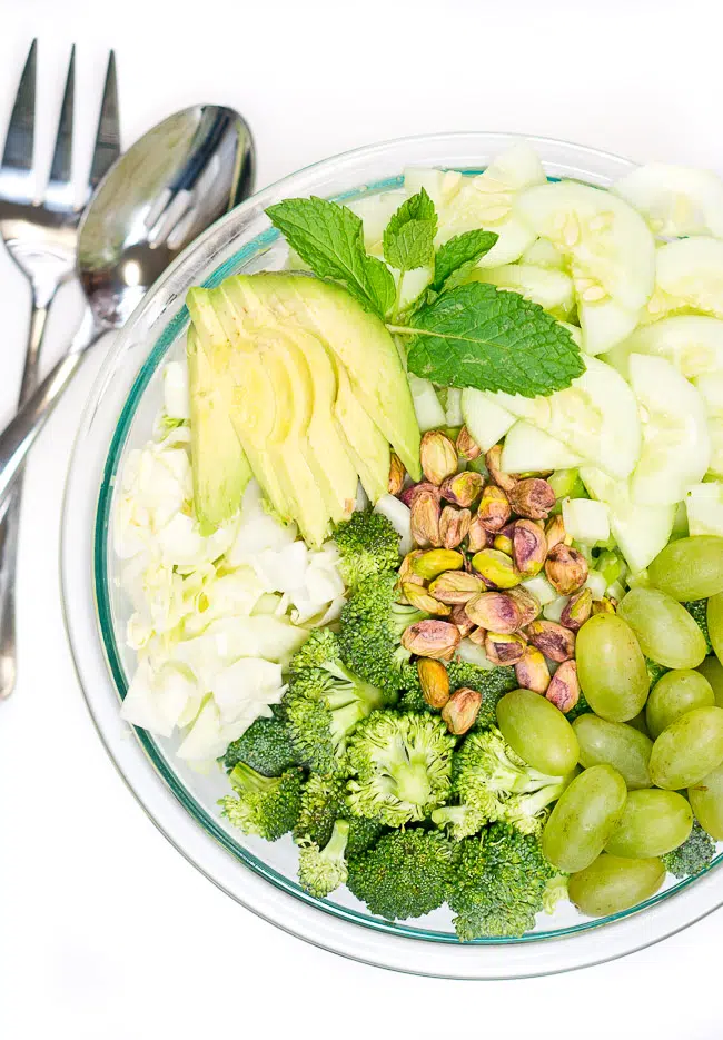 Close-up of Green Goddess Detox Salad with avocado, broccoli, and grapes