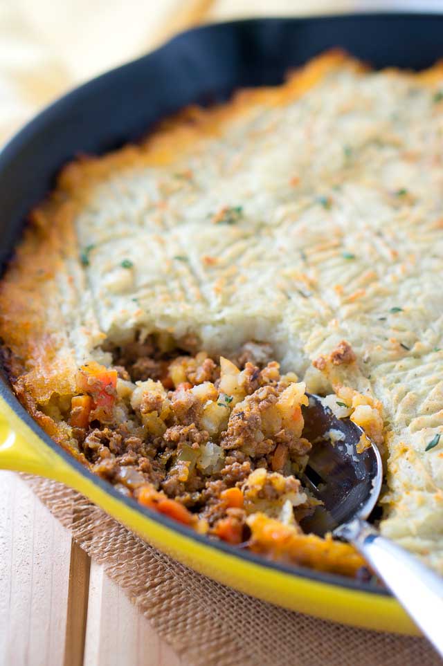 Easy Skillet Shepherd's Pie - a deliciously rich and hearty beef and vegetables meal covered with a blanket of mashed potatoes and baked to perfection.