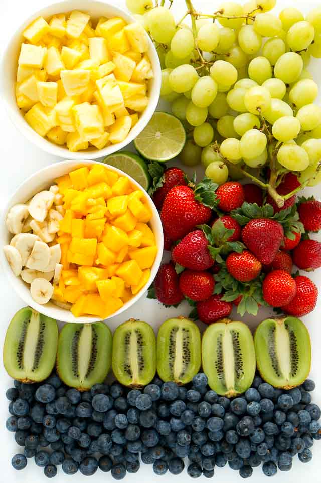 fruit for a fruit salad on a board