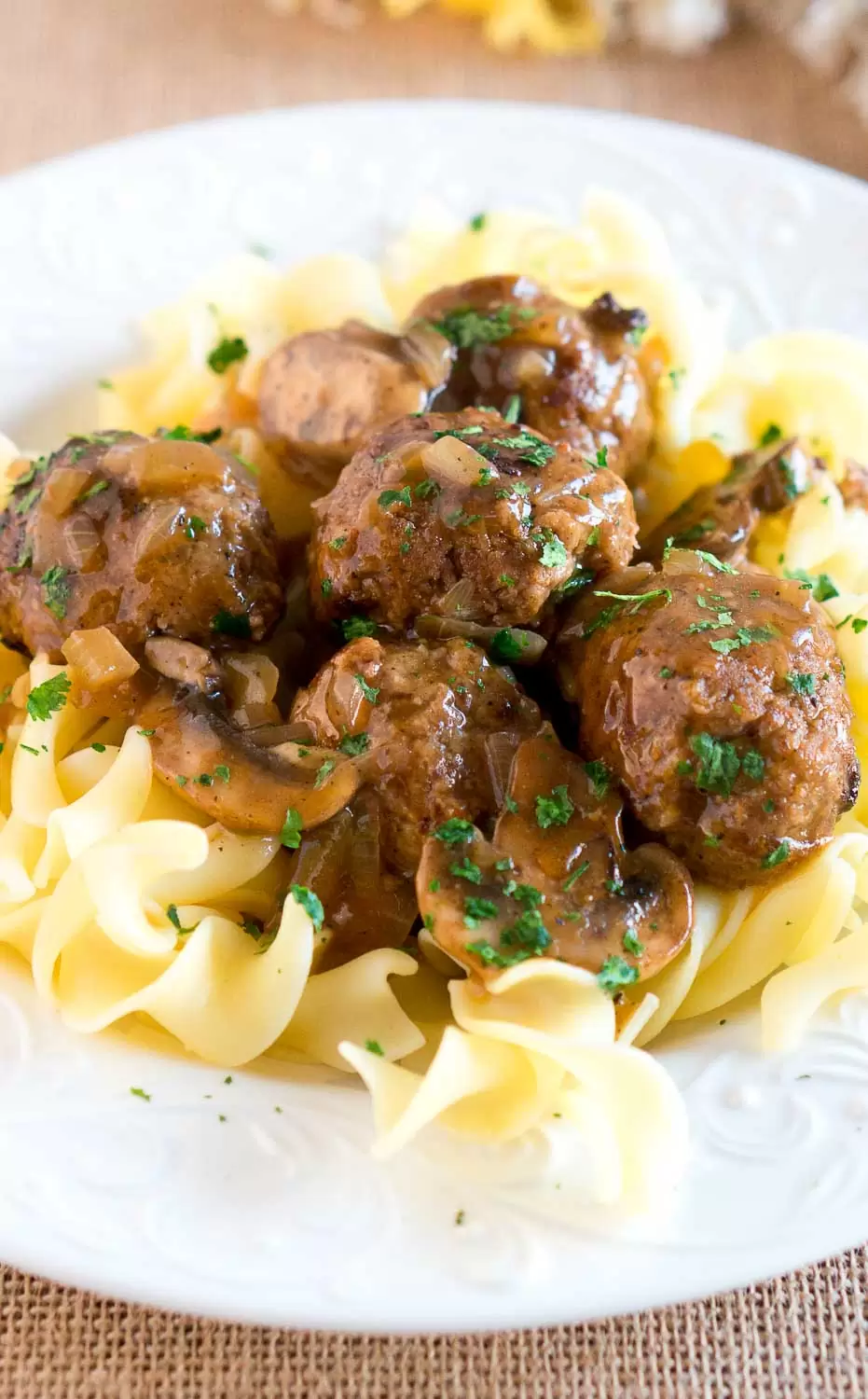 Salisbury Steak Meatballs w/ Mushroom Gravy is a great dinner idea for busy weeknights. It comes together in 30 minutes - so delicious & comforting!