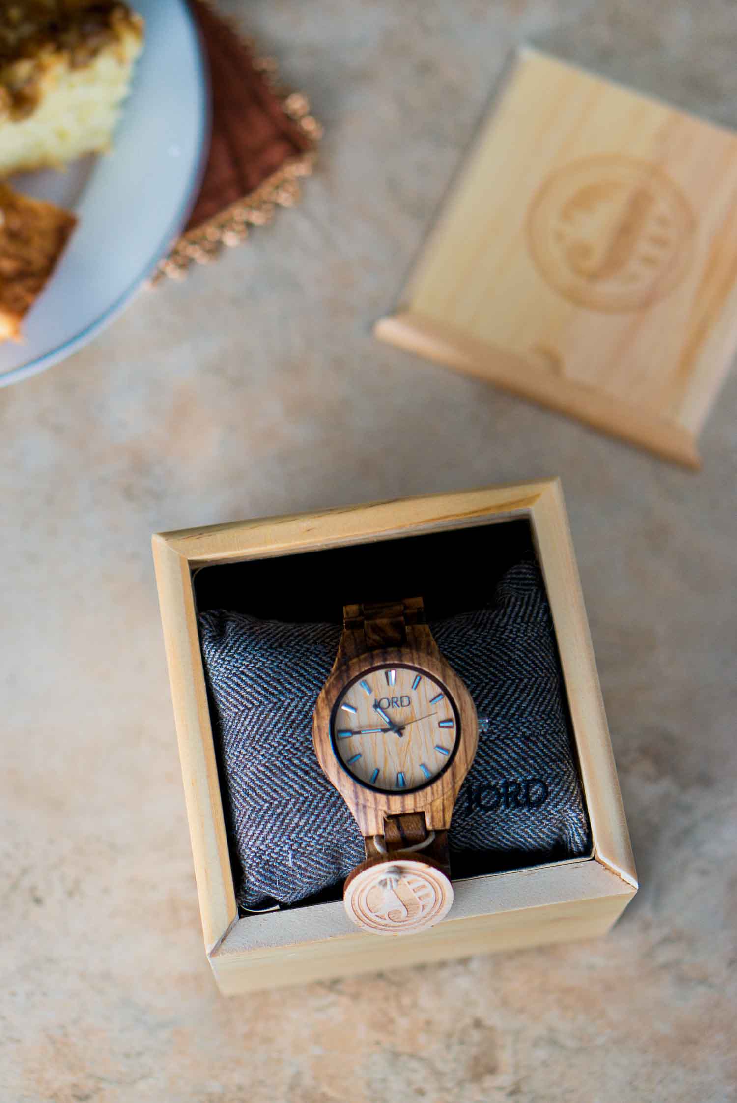 A close up of a watch in a box