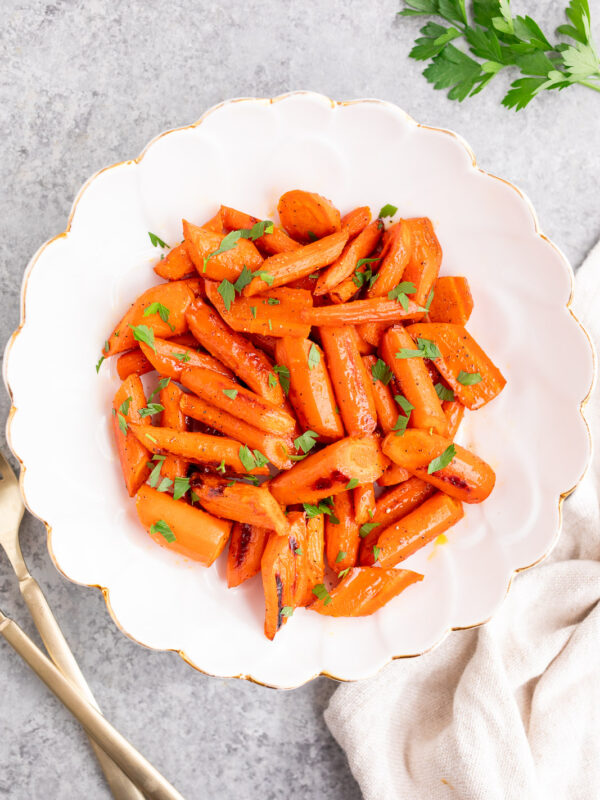 honey glazed carrots served in a white bowl