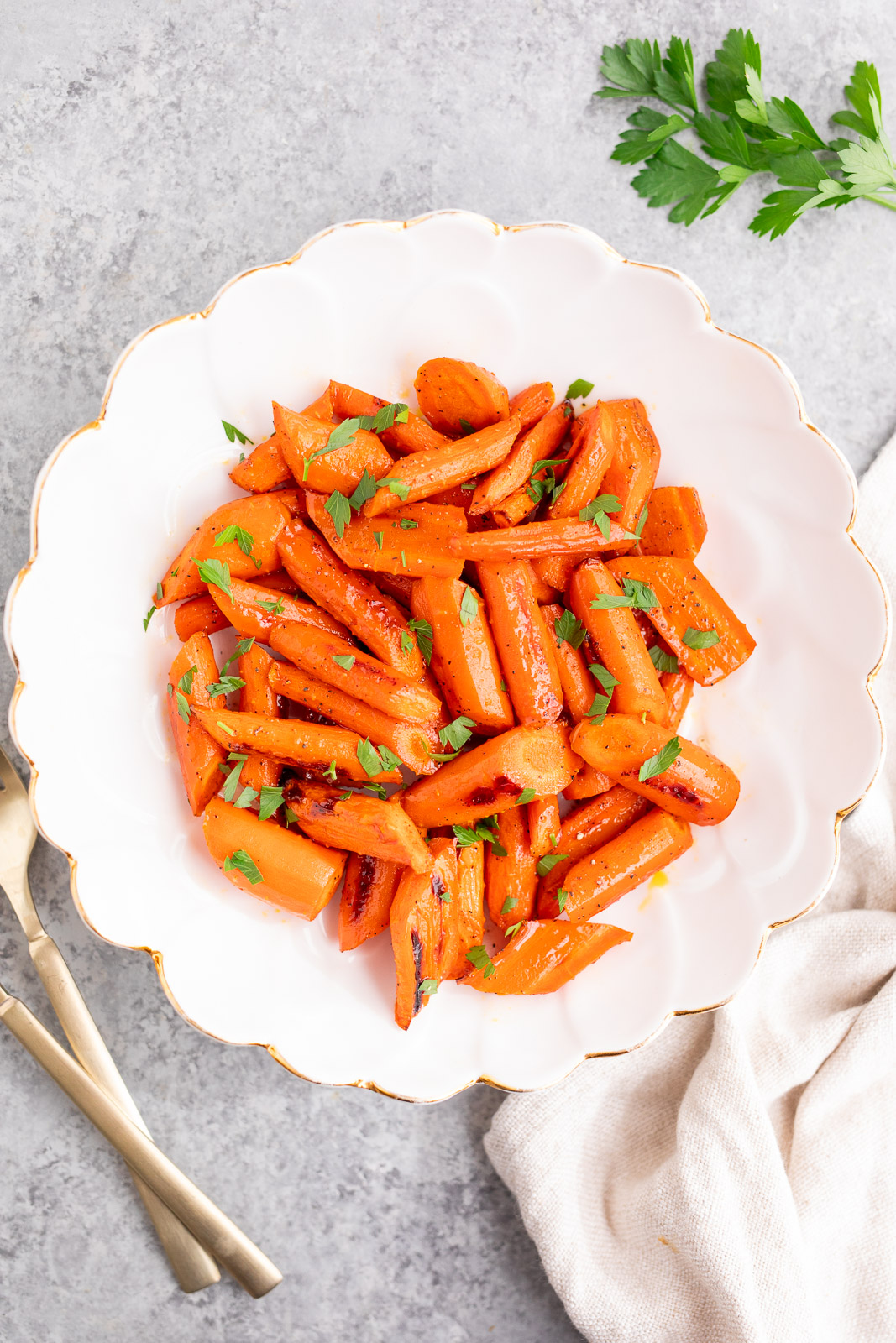 honey glazed carrots served in a white bowl