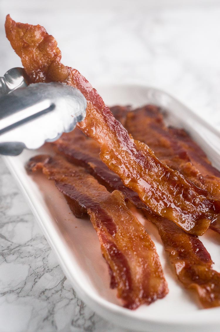 baked bacon in the oven served on a platter