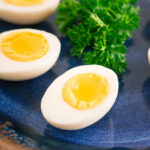 hard boiled eggs on a blue plate