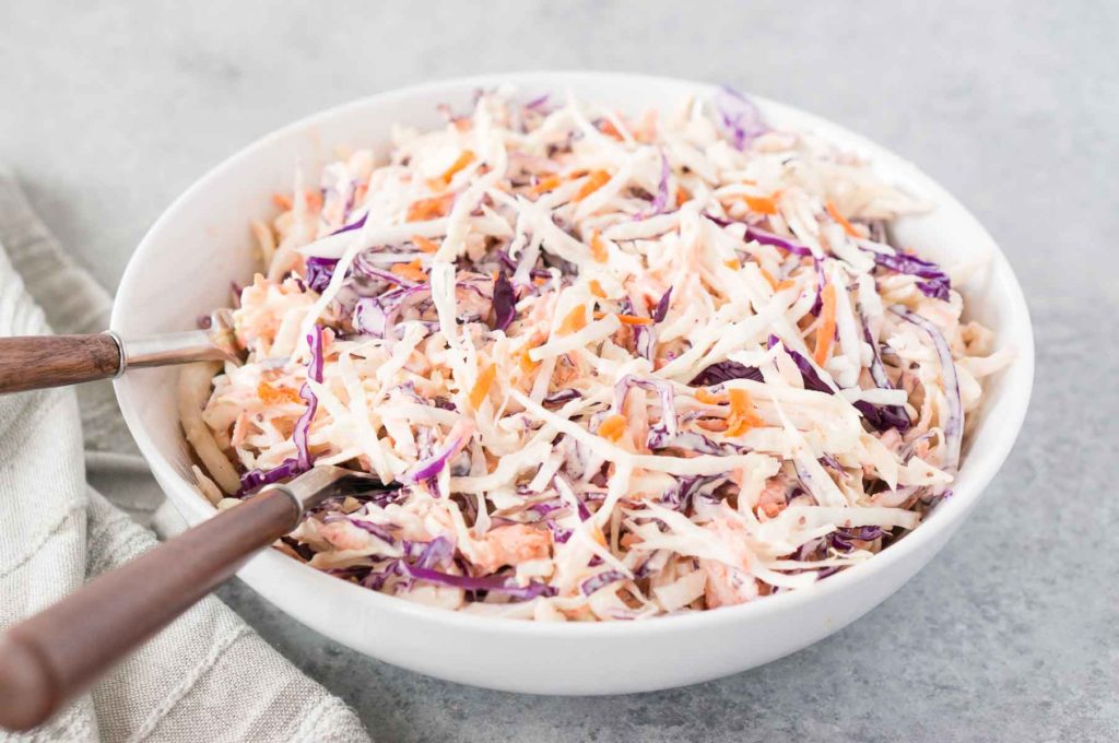 Coleslaw recipe in a bowl with a spoon
