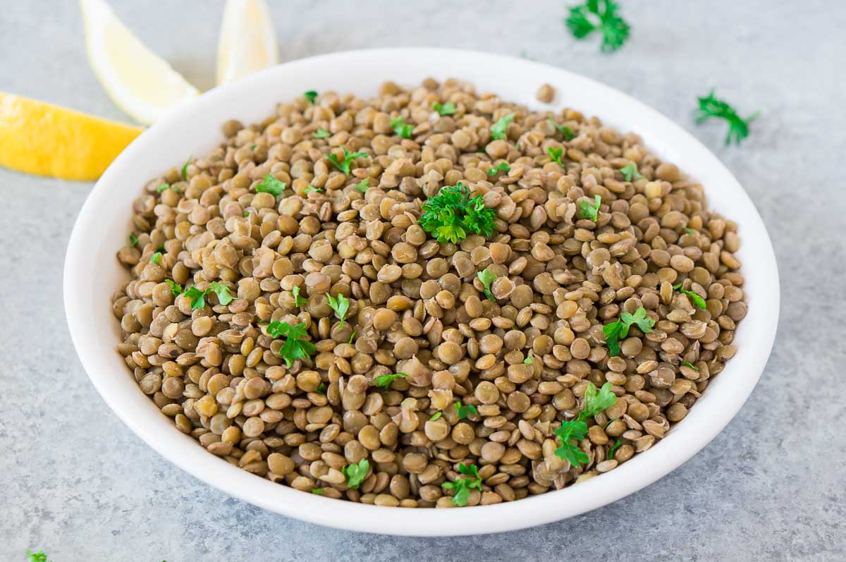 cooked lentils in a white bowl