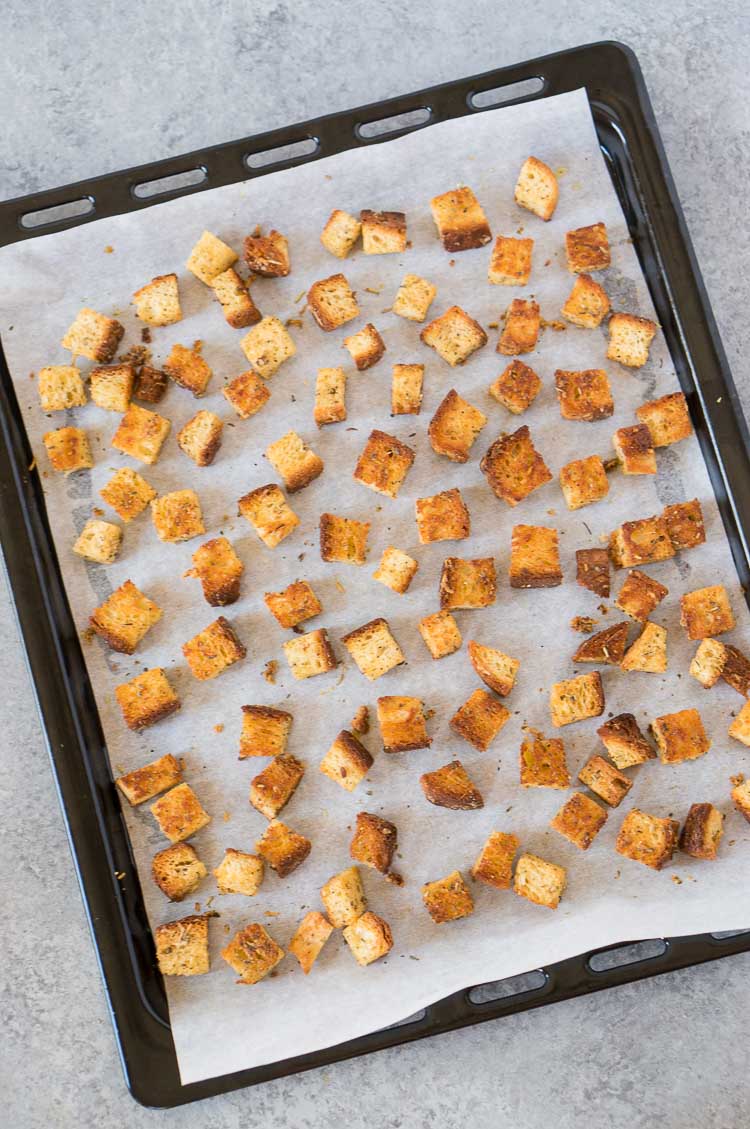 homemade croutons on a baking sheet