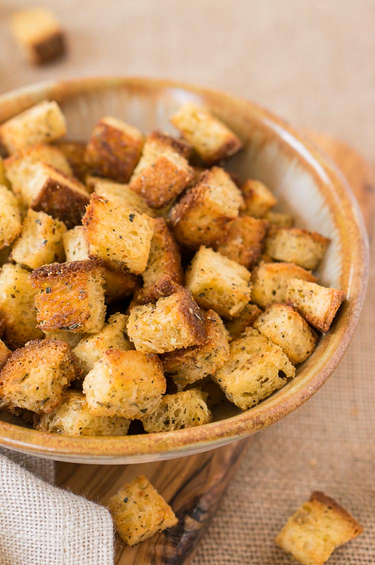 homemade croutons with gluten free bread and parmesan in a bowl