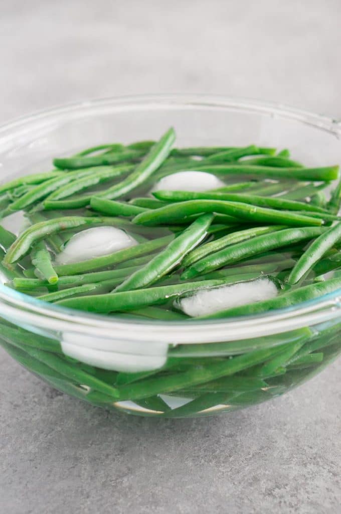 shocking blanched green beans in ice cold water