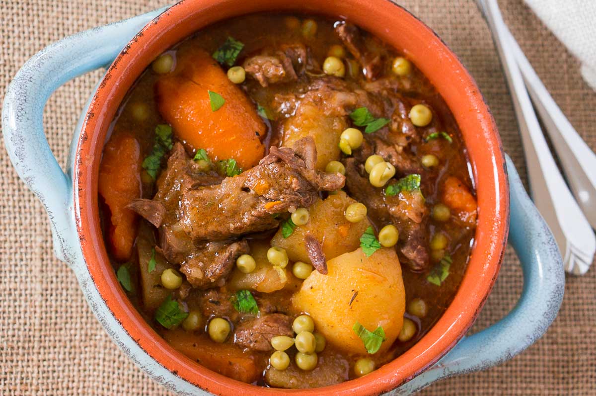 beef stew made in instant pot served in bowls