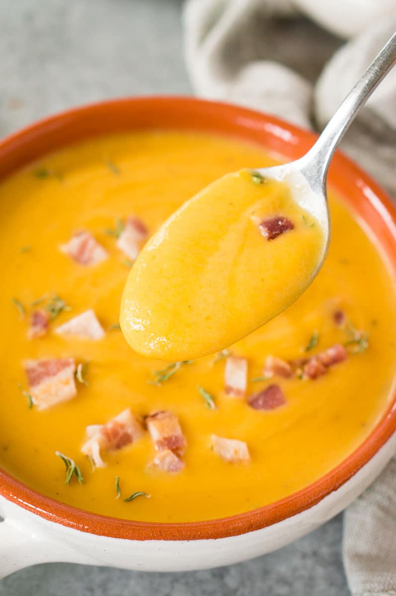 a spoonful of creamy butternut squash soup