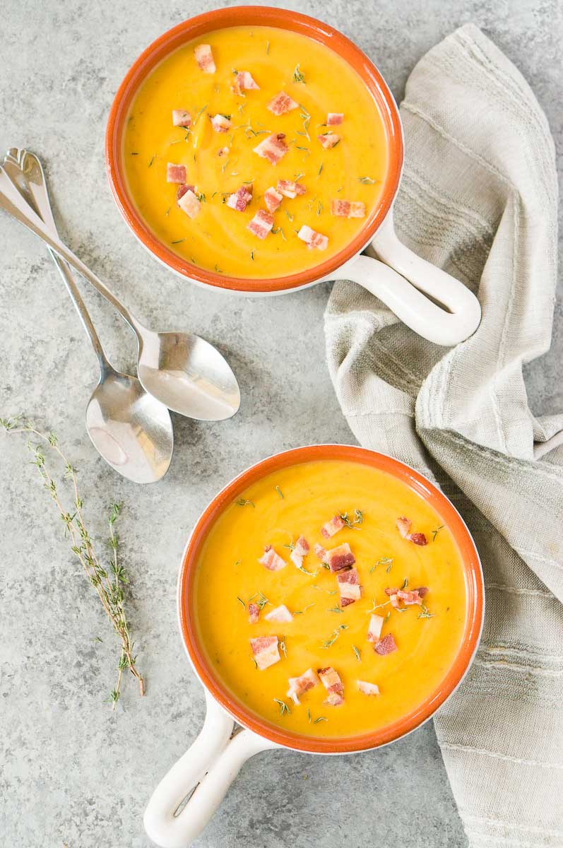 bowls with comforting butternut squash apple soup