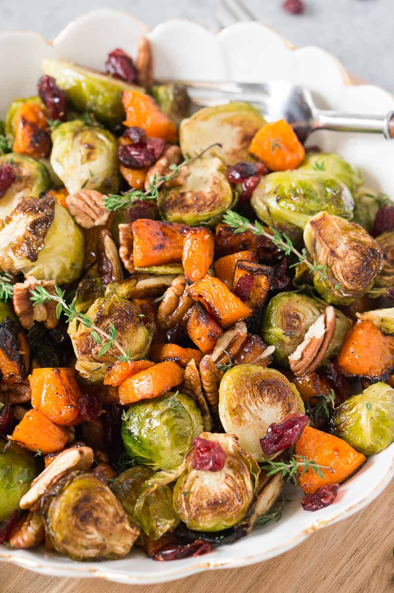 roasted vegetables for Thanksgiving in a white bowl