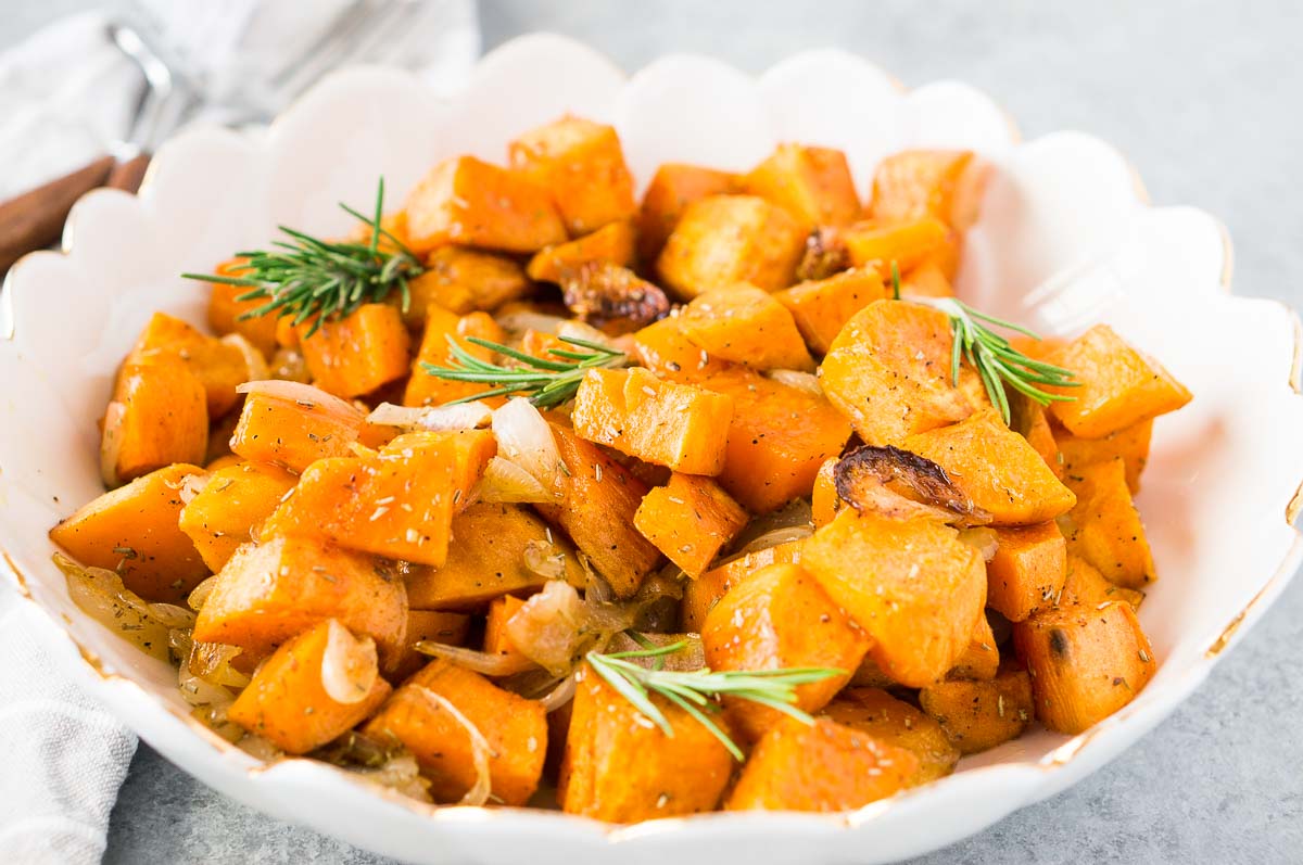 whole30 sweet potatoes and onions side dish for thanksgiving in a white bowl