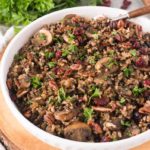 wild rice with mushrooms pilaf recipe in a white bowl