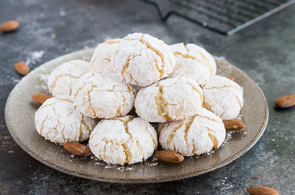 stacked gluten-free almond cookies on a plate