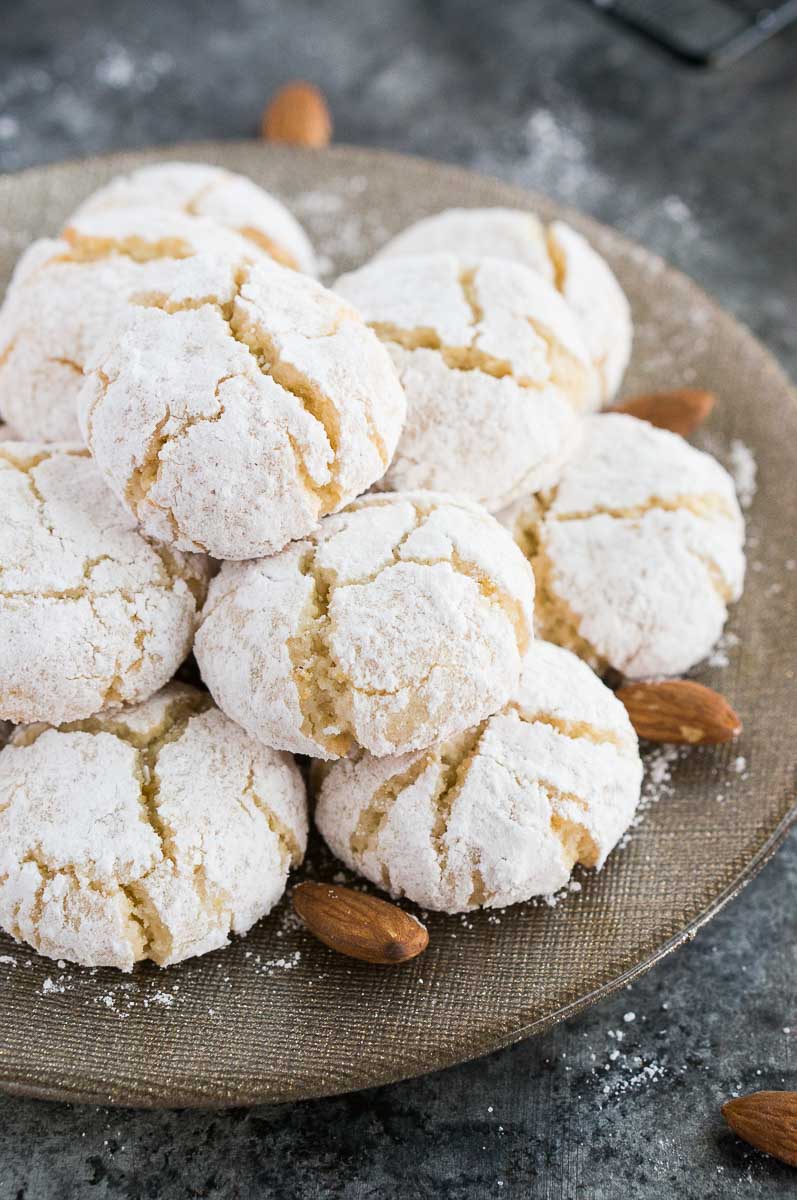 close up shot of chewy amaretti cookies on a plate