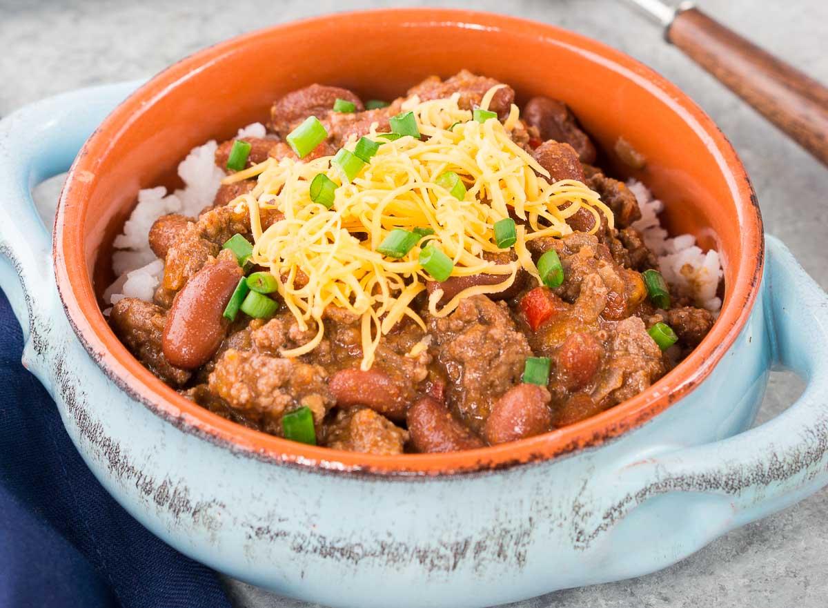 chili with beans in a clay bowl
