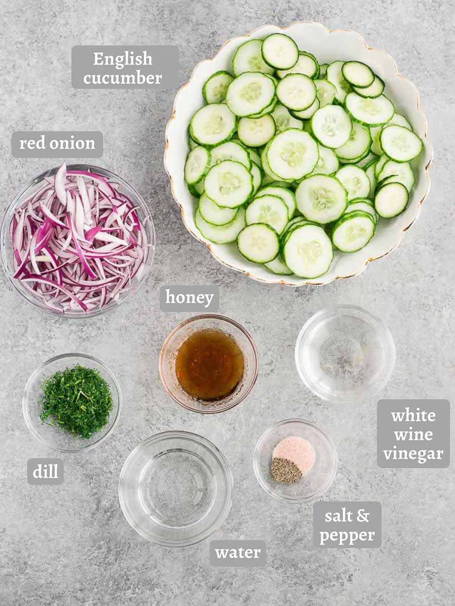 cucumber salad ingredients on a board