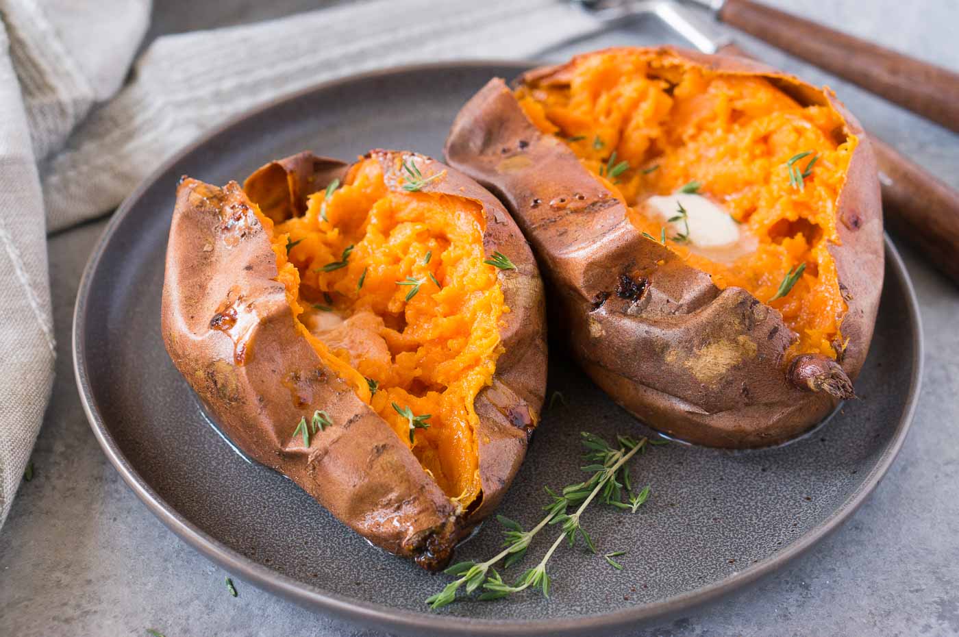 two sweet potatoes with butter
