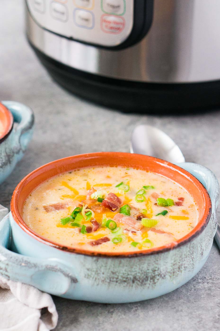 creamy soup in a clay bowl
