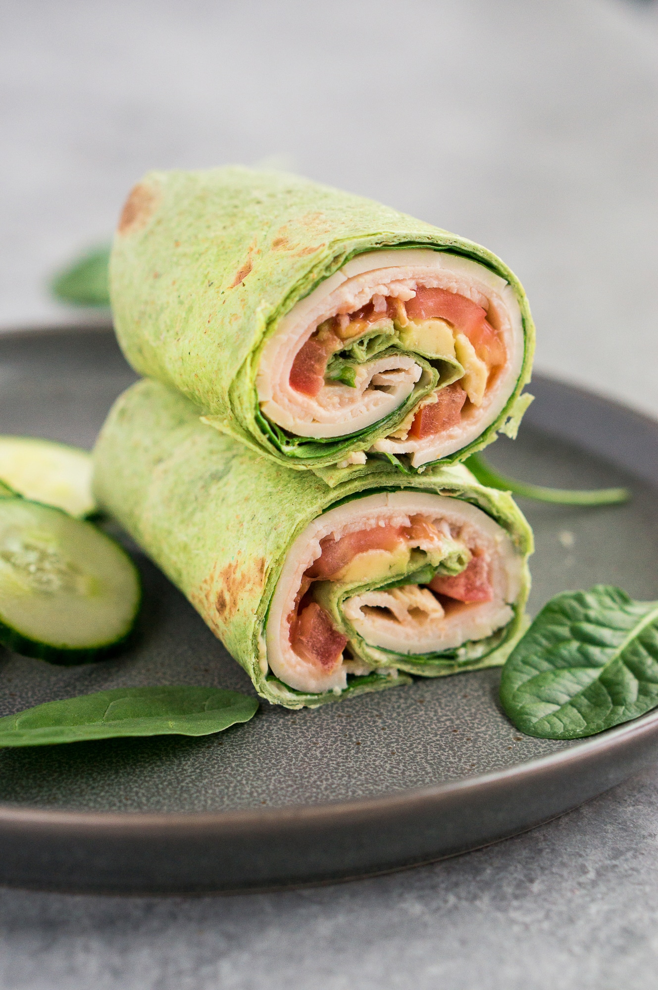 stacked wraps on a plate