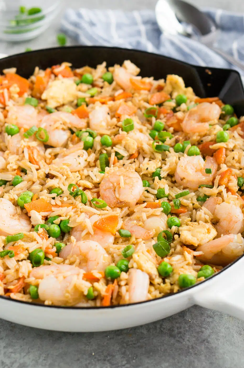 Delicious shrimp fried rice prepared in a large skillet, ready to be served for a family meal.