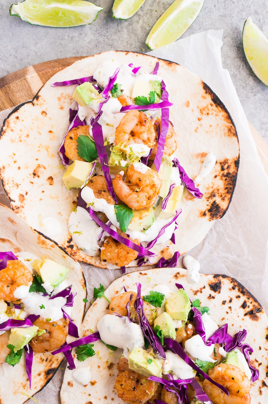 close up shot of taco with shrimp and cabbage