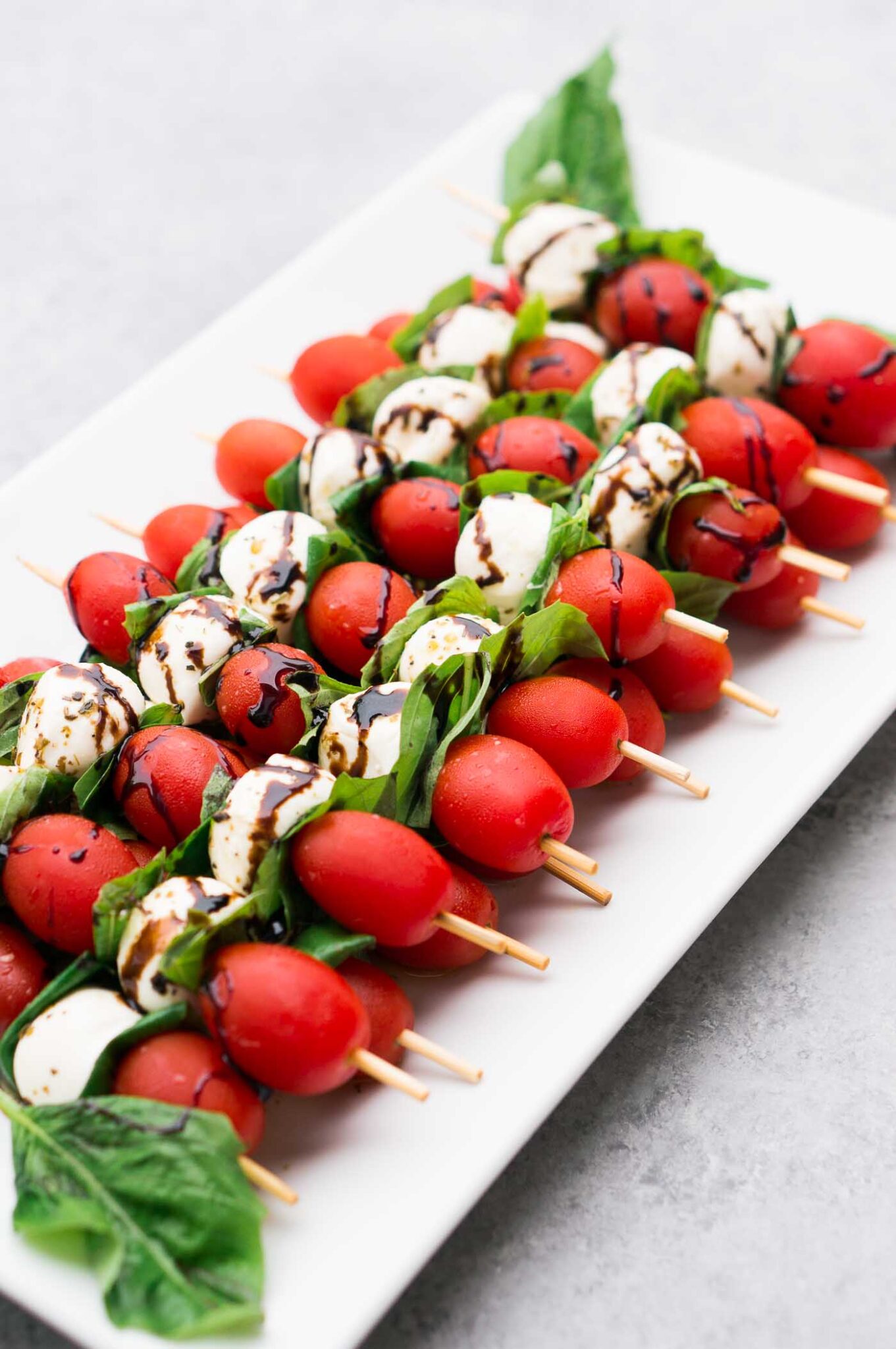 Caprese Salad skewers with mozzarella balls and grape tomatoes