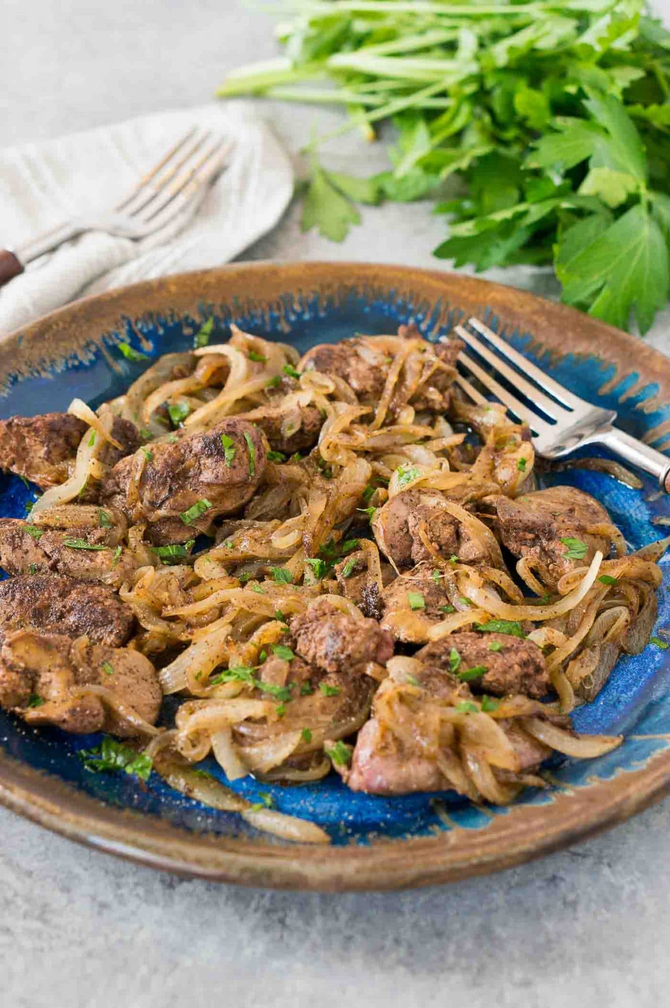 livers and onions on a plate