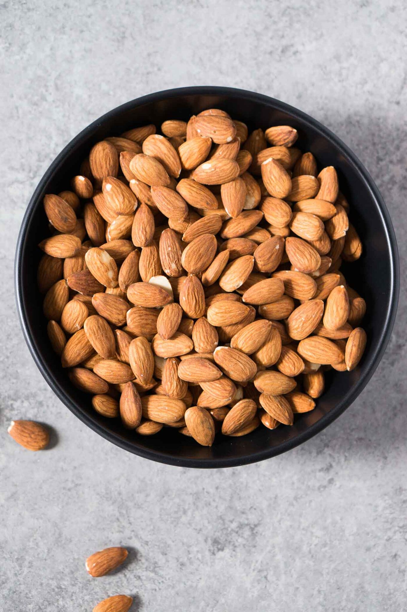 almonds in a black bowl