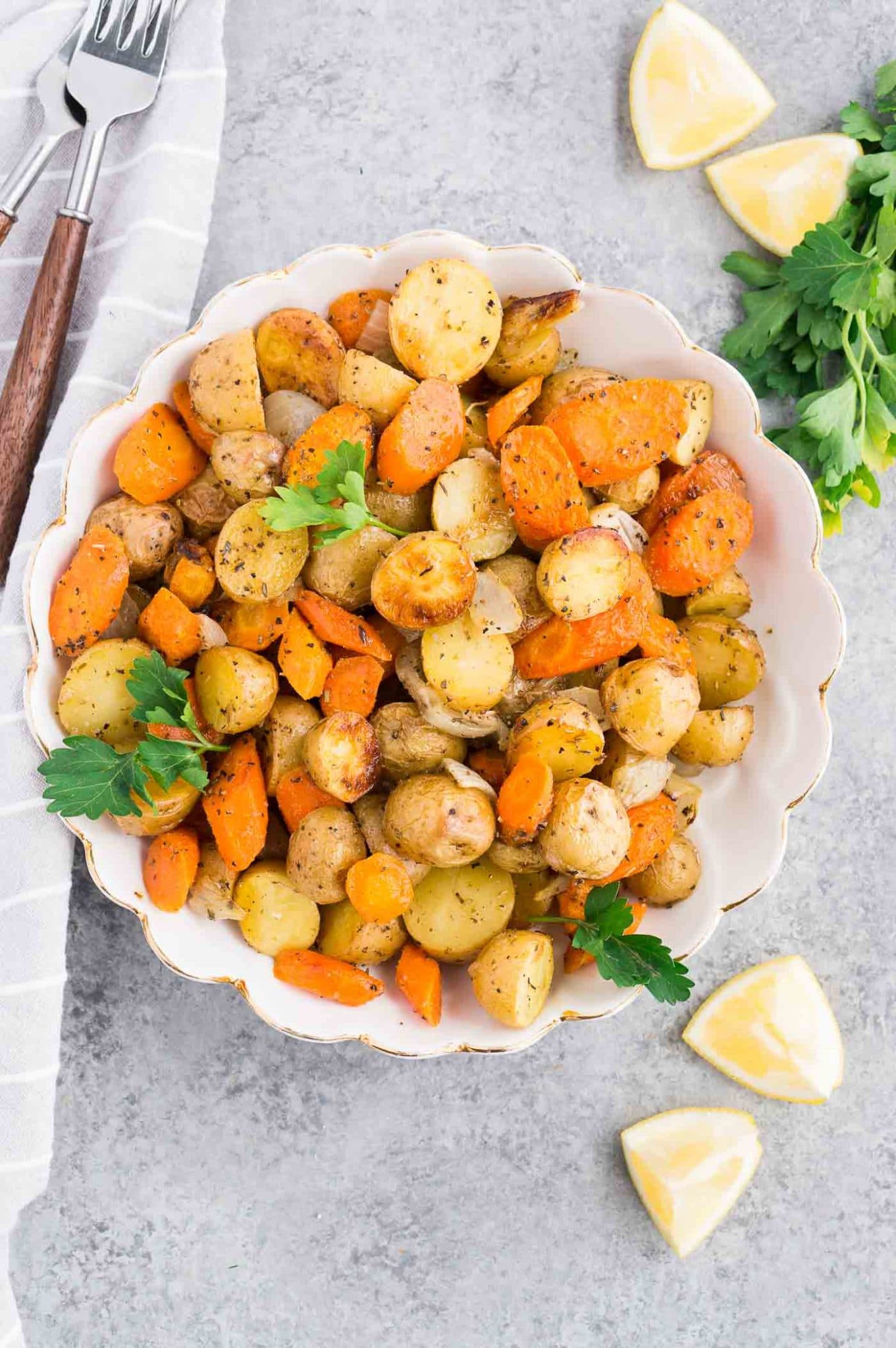 roasted carrots and potatoes in a serving bowl