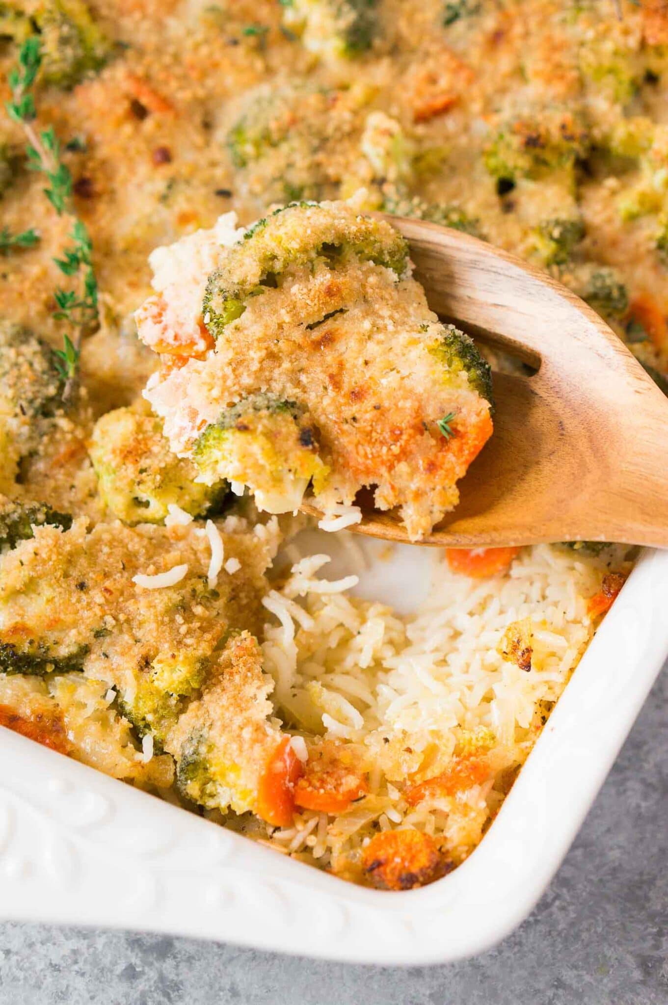 a scoop from the rice casserole with broccoli and cheese