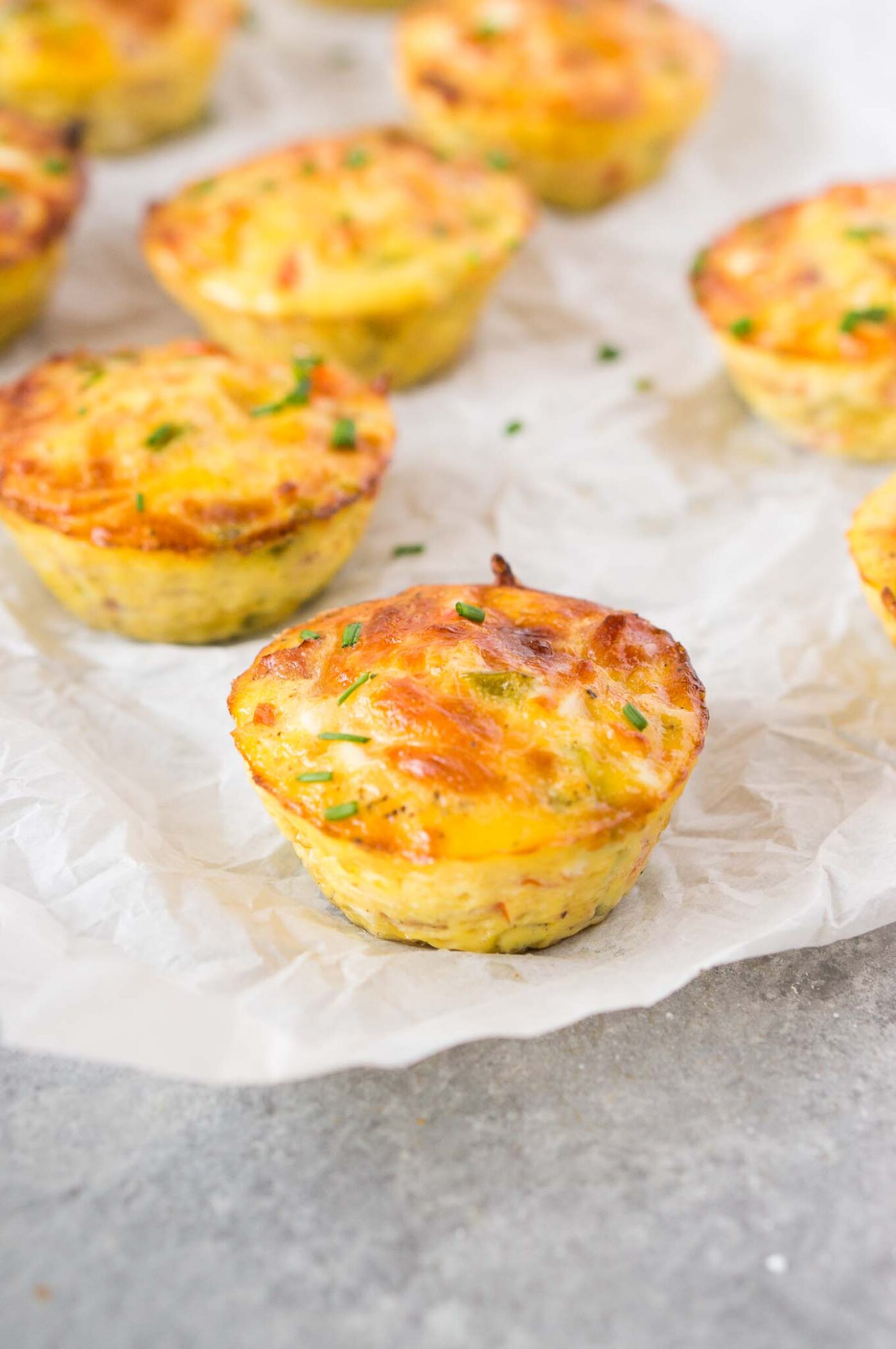 close up image of  breakfast muffins with ham and cheese