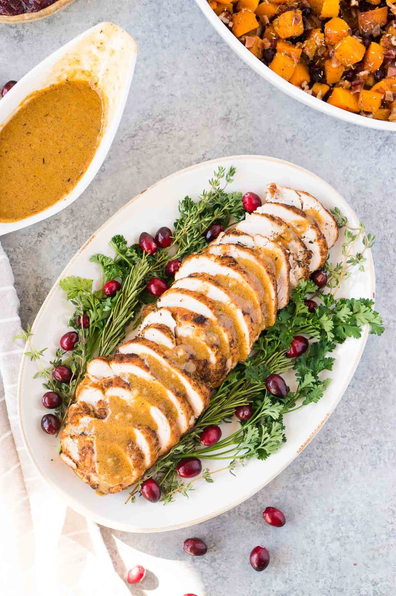 sliced turkey breast with gravy for thanksgiving