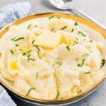 mashed potatoes with slice of butter in a bowl