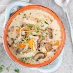 instant pot chicken wild rice soup in a clay bowl