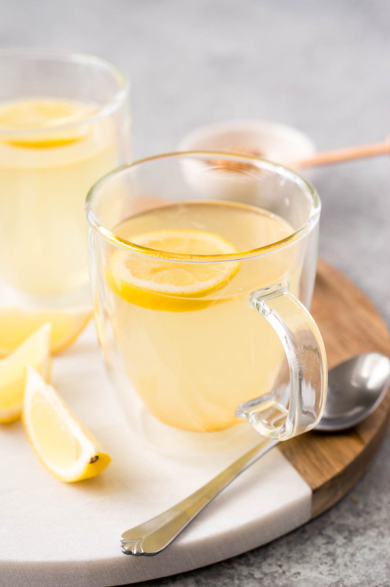 lemon tea in glass cup with lemon slice