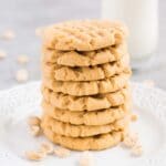 stacked soft peanut butter cookies on a plate