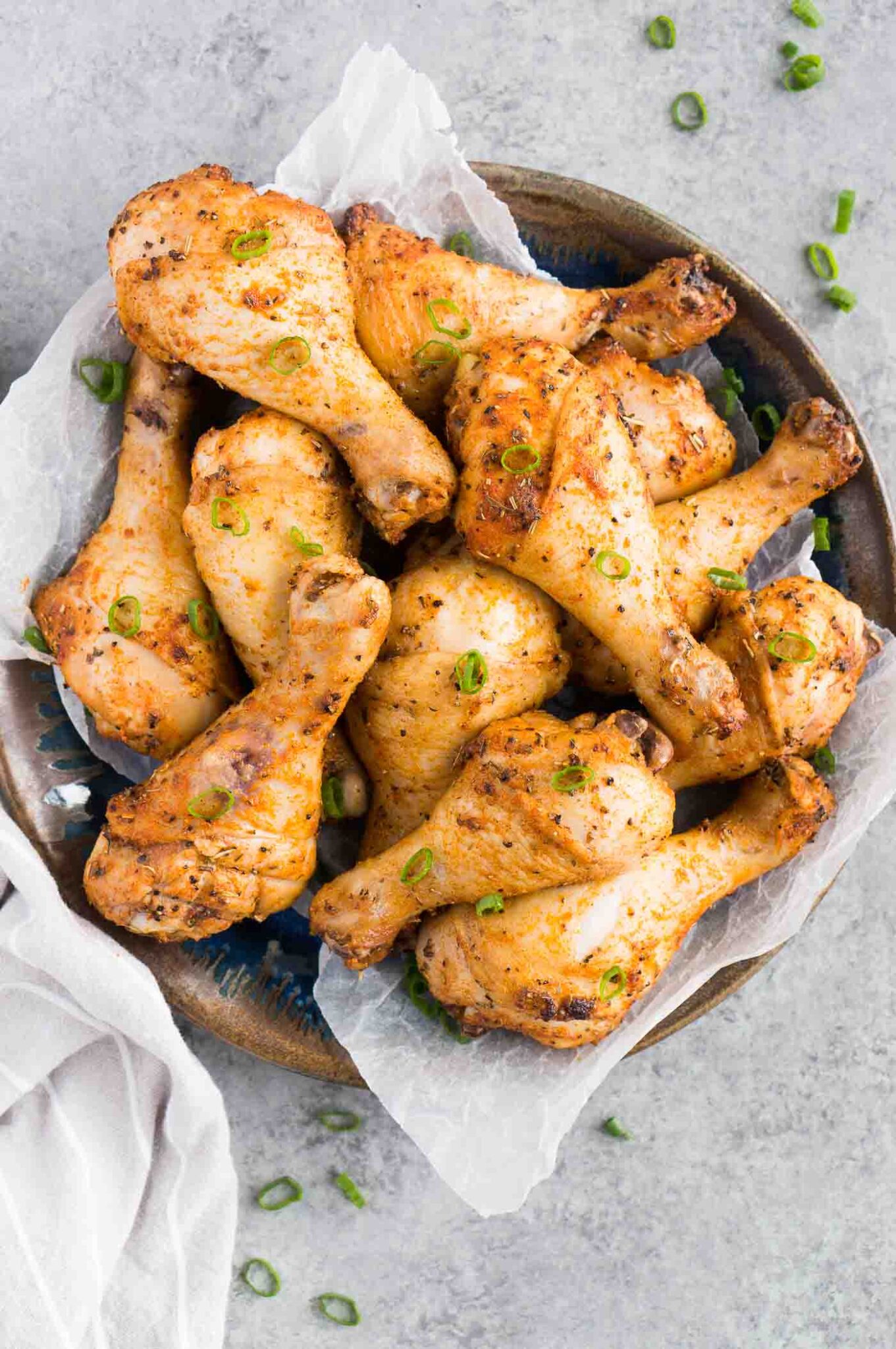 oven fried chicken legs on a plate