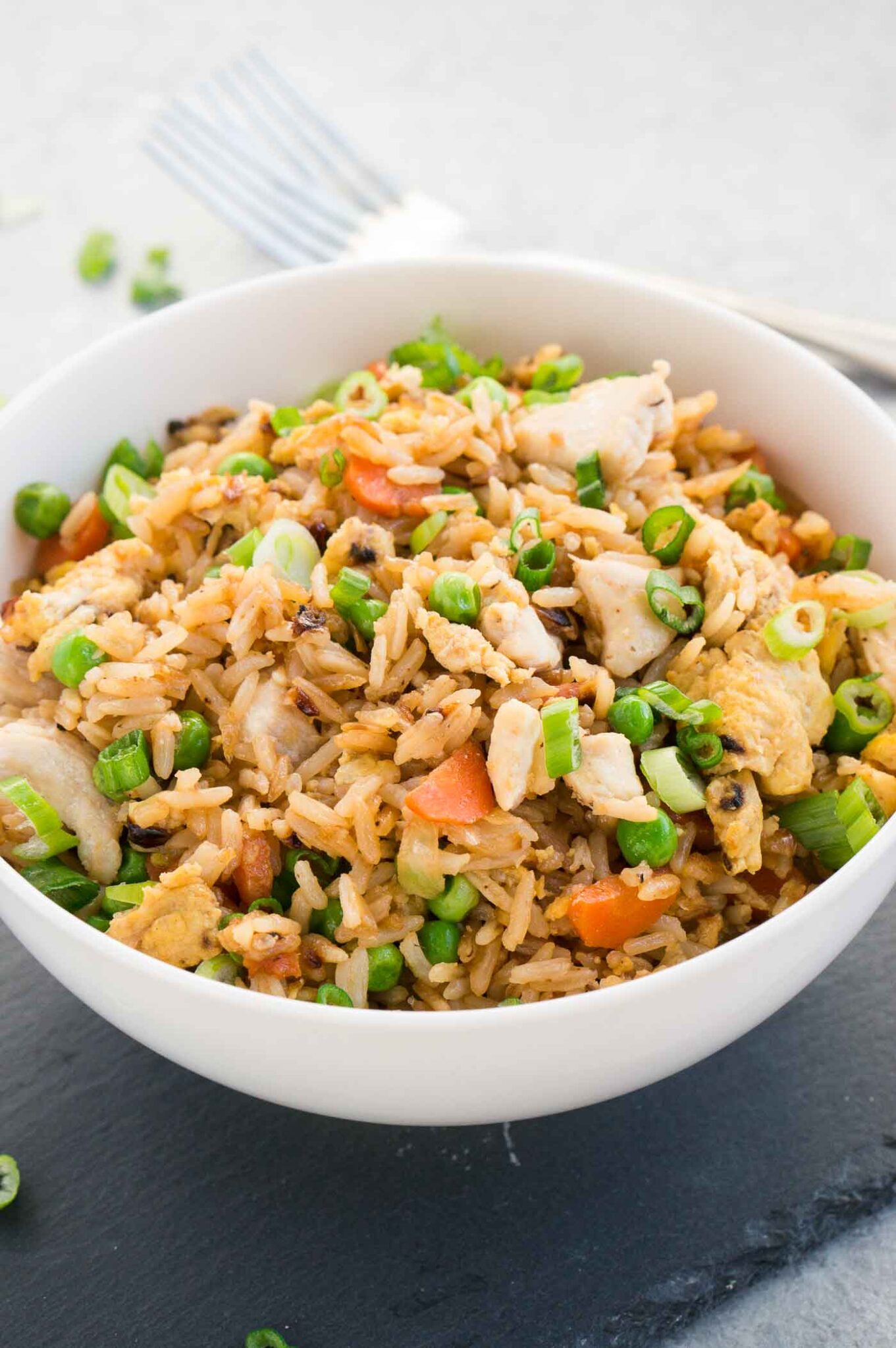 best chicken fried rice with green onions in a bowl