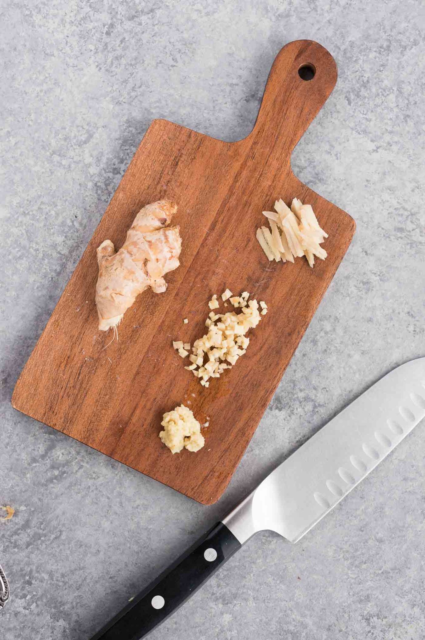 chopped and minced ginger on a board
