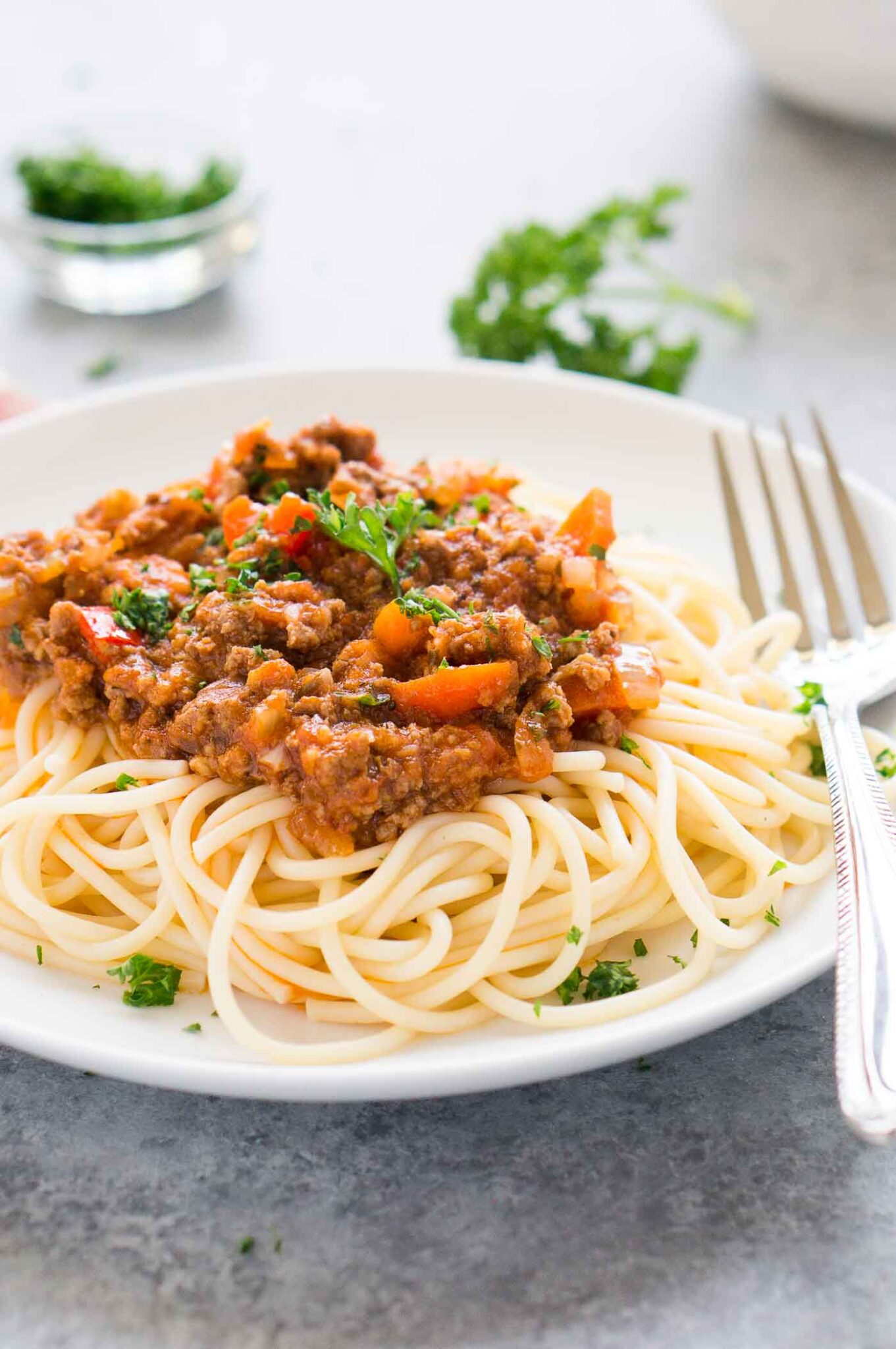 Bolognese sauce over cooked pasta