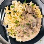 traditional beef and mushroom stroganoff over noodles