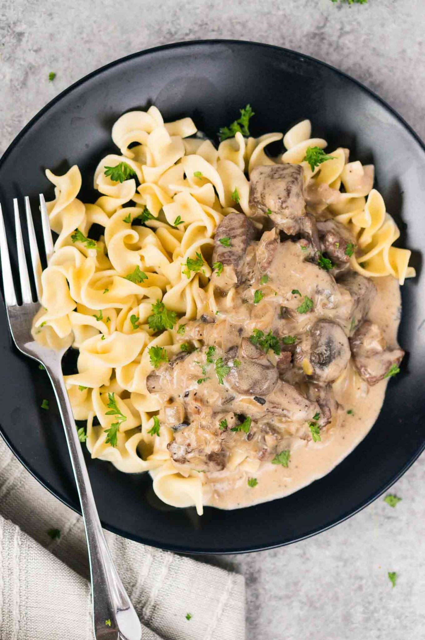 traditional beef and mushroom stroganoff over noodles