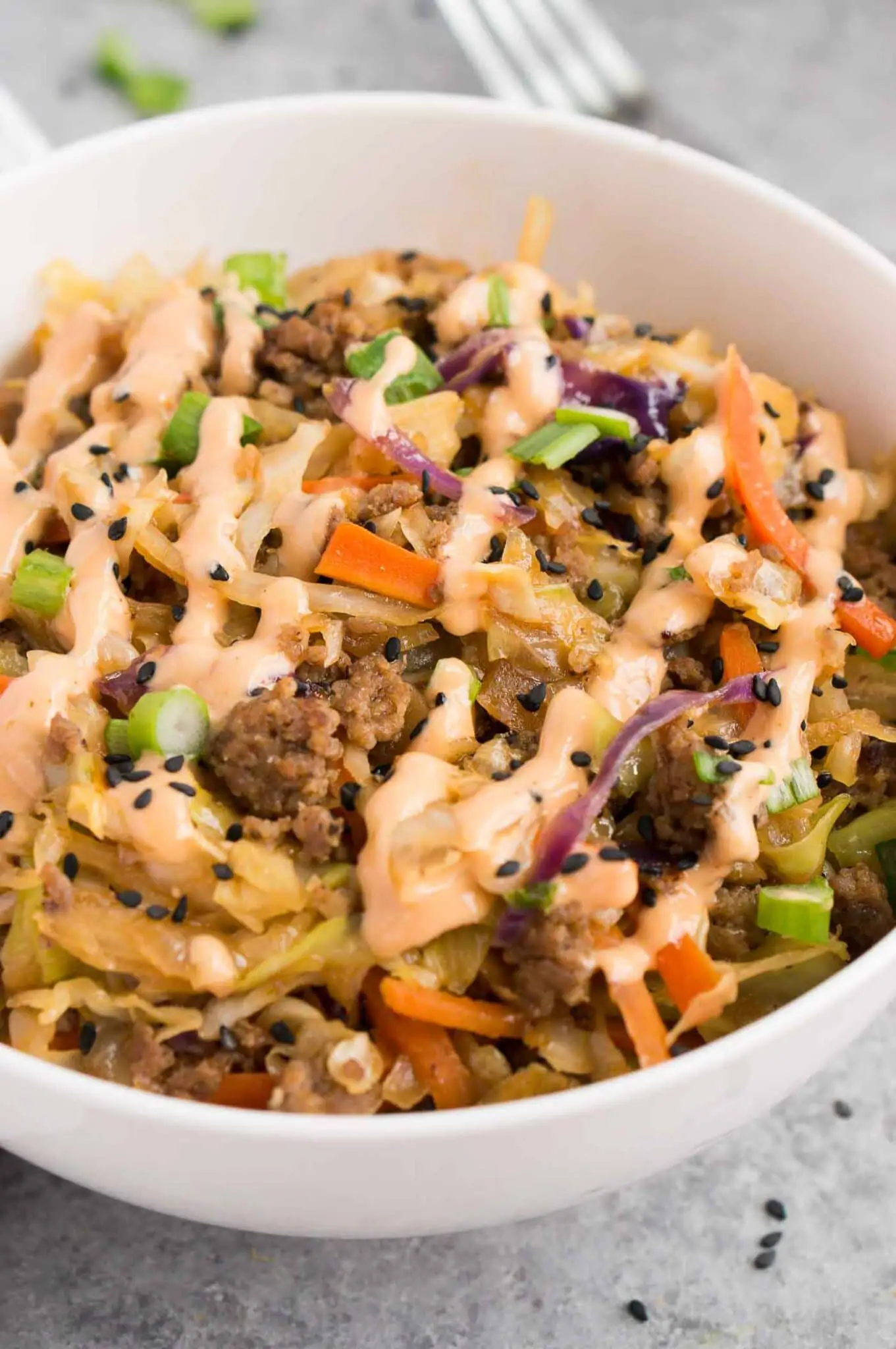 close up image of egg roll in a bowl