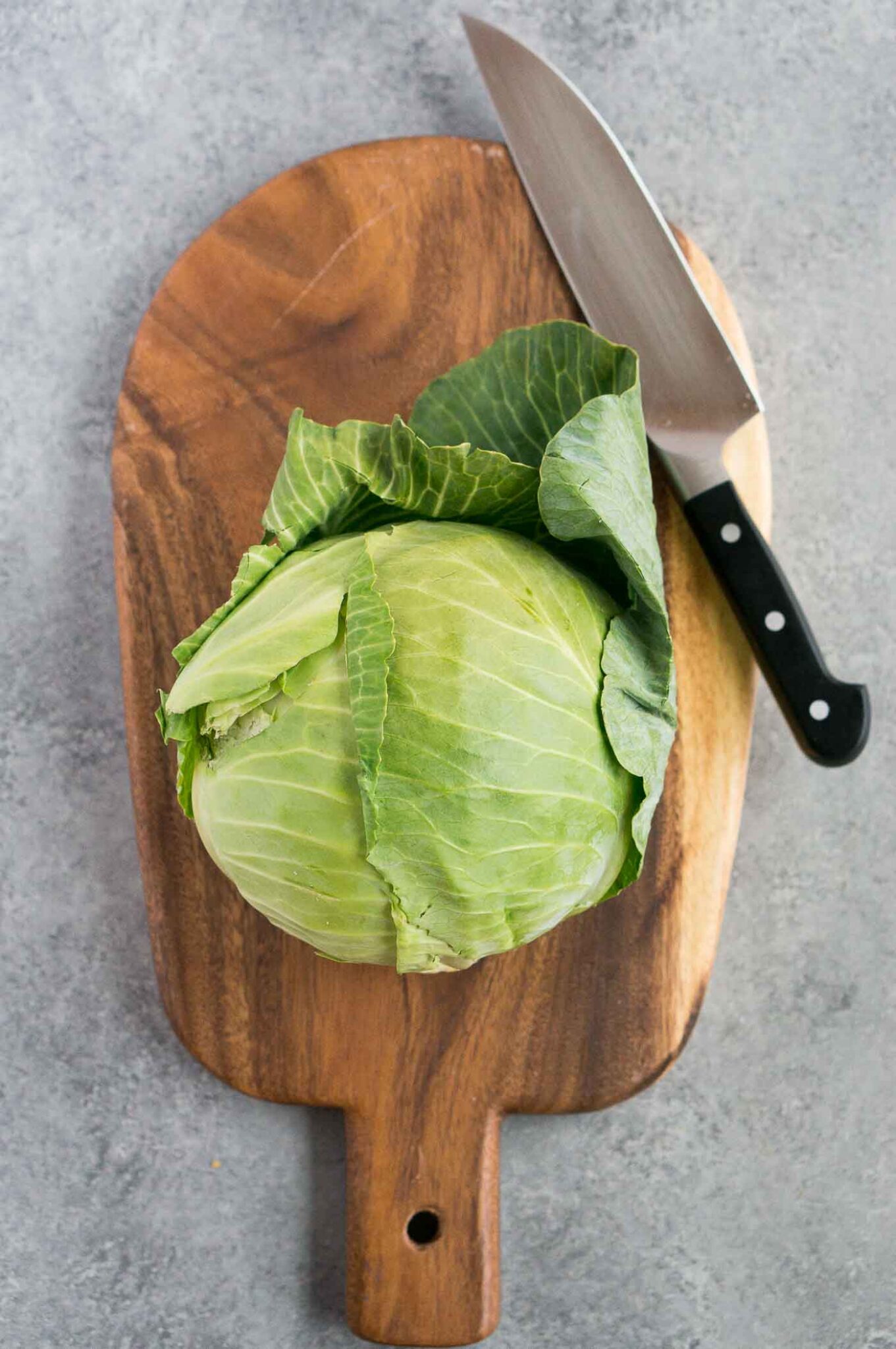 cabbage on a wooden cutting board