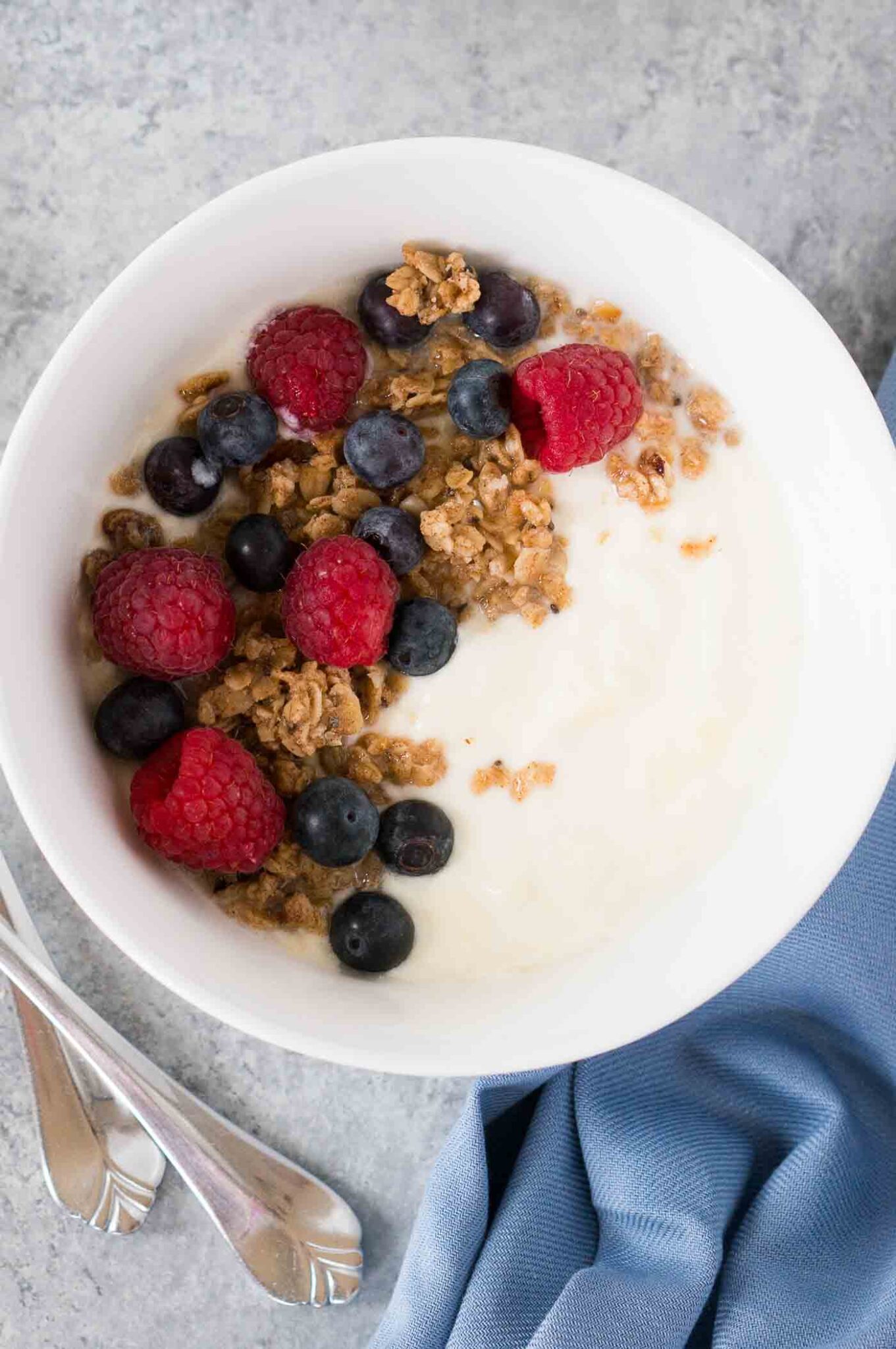 close up image of pressure cooker yogurt with berries and yogurt