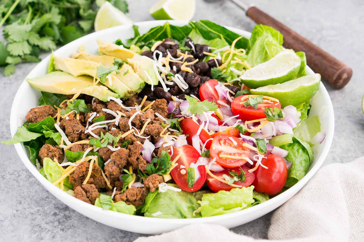 close up image of taco salad in a bowl